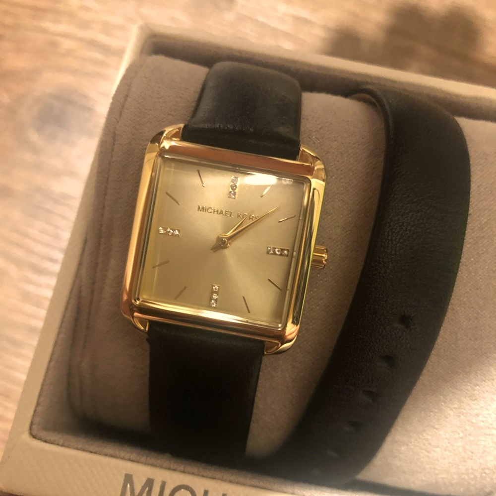 Gold MK watch